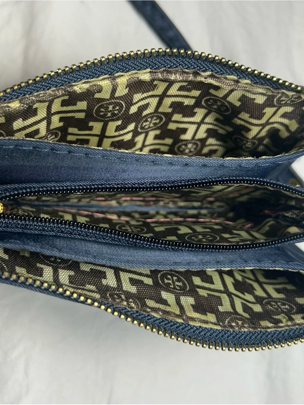 Tory Burch Navy Wristlet with Gold Emblem
